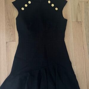 Sandro Black dress with gold buttons and ruffle hem